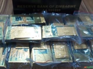Caixa Zimbabwe Gold - 100 Notas de 100 Trilhões