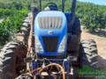 Trator New Holland TL 5.80 4x4 (Único Dono) Imagem Trator New Holland TL 5.80 4x4 (Único Dono)