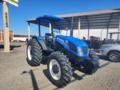 Trator New Holland TL 5.80 plataformado . Imagem Trator New Holland TL 5.80 plataformado .