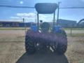Trator New Holland TL 5.80 plataformado . Imagem Trator New Holland TL 5.80 plataformado .