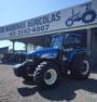 Trator New Holland TM 7040 cabinado. Imagem Trator New Holland TM 7040 cabinado.