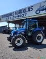 Trator New Holland cabinado TL 95. Imagem Trator New Holland cabinado TL 95.