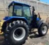 TRATOR AGRÍCOLA NEW HOLLAND, MODELO TS6020 4X4, ANO 2013, COM 5.088HS TRABALHADAS, CABINE COM A/C