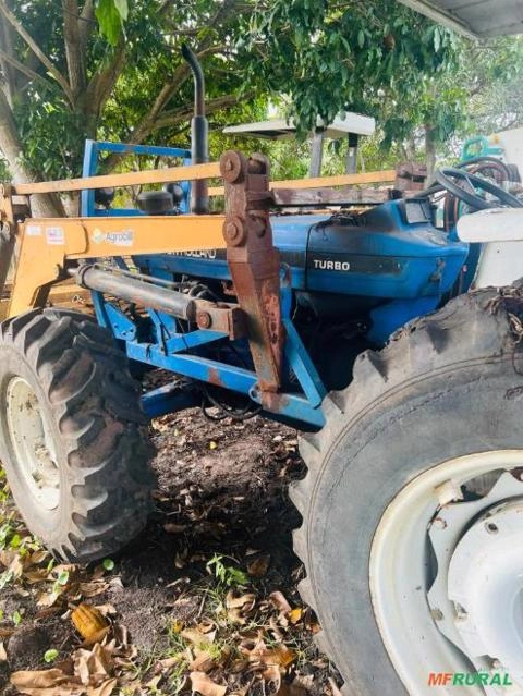 Imagem TRATOR AGRÍCOLA NEW HOLLAND, 7630 4X4, ANO 1997, MOTOR OHV4.304T 4CC TURBO DE 103HP, CAÇAMBA AGROBIL Imagem TRATOR AGRÍCOLA NEW HOLLAND, 7630 4X4, ANO 1997, MOTOR OHV4.304T 4CC TURBO DE 103HP, CAÇAMBA AGROBIL