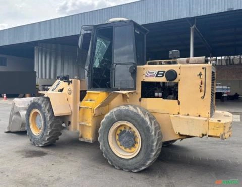 PÁ CARREGADEIRA NEW HOLLAND MODELO 12B ANO 2007, OPERACIONAL, PESO OPERACIONAL DE 10.595 KG Imagem PÁ CARREGADEIRA NEW HOLLAND MODELO 12B ANO 2007, OPERACIONAL, PESO OPERACIONAL DE 10.595 KG