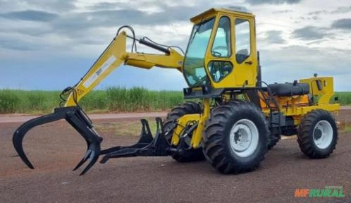 Carregadeira de cana Motocana ano 2007 Revisada VALTRA 1280 4x4 completa com garra e rastelo Imagem Carregadeira de cana Motocana ano 2007 Revisada VALTRA 1280 4x4 completa com garra e rastelo