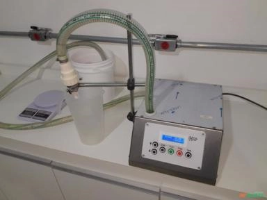 ENVASADORA DE PRECISAO PARA PASTOSOS E LIQUIDOS Imagem ENVASADORA DE PRECISAO PARA PASTOSOS E LIQUIDOS