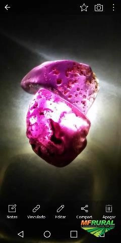 Permuta em Rubis Brutos e canga de esmeralda Imagem Permuta em Rubis Brutos e canga de esmeralda