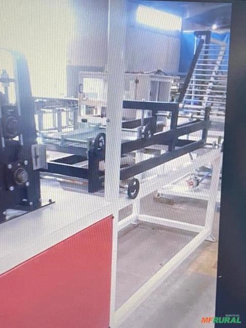 Imagem MÁQUINA PARA FABRICAÇÃO DE CANTONEIRAS DE PAPELÃO Imagem MÁQUINA PARA FABRICAÇÃO DE CANTONEIRAS DE PAPELÃO