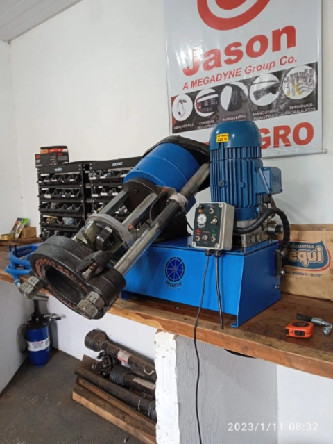 PRENSA DE MANGUEIRA COM MAQUINA DE CORTE Imagem PRENSA DE MANGUEIRA COM MAQUINA DE CORTE