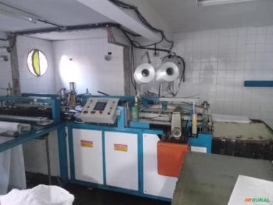 MÁQUINA DE CORTE/COSTURA AUTOMÁTICA VITRA Imagem MÁQUINA DE CORTE/COSTURA AUTOMÁTICA VITRA