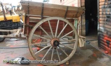 Carroção de café antigo, roda de ferro Carroção de café antigo, roda de ferro