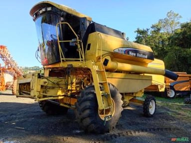 Colheitadeira New Holland TC 57 3369 Horas 19 pés Ano 2000 Imagem Colheitadeira New Holland TC 57 3369 Horas 19 pés Ano 2000