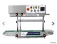 Seladora automática continua de embalagens Imagem Seladora automática continua de embalagens