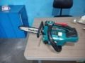 Motosserra Makita DUC254 + 4 baterias + carregador + maleta + sabre e corrente Imagem Motosserra Makita DUC254 + 4 baterias + carregador + maleta + sabre e corrente
