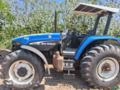 Trator New Holland TM135 (4x4) 135cv - Ano 2003 Imagem Trator New Holland TM135 (4x4) 135cv - Ano 2003