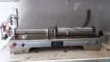 MÁQUINA ENVASADORA DE LIQUIDOS DE 100 ML A 1 LITRO Imagem MÁQUINA ENVASADORA DE LIQUIDOS DE 100 ML A 1 LITRO