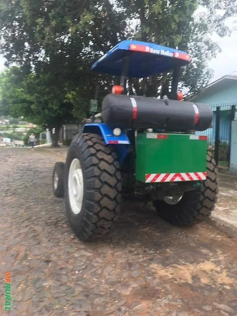 trator com capinadeira Imagem trator com capinadeira