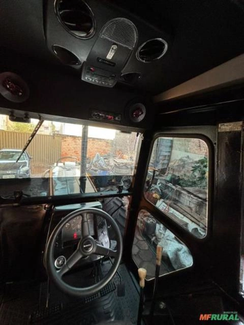 Imagem Trator Bh 180 com Auto Carregável Tmo, 7mt. Imagem Trator Bh 180 com Auto Carregável Tmo, 7mt.