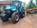 Trator New Holland TM 7040 – Ano 2013 Imagem Trator New Holland TM 7040 – Ano 2013