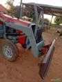 Trator Massey Ferguson 290 com grade Imagem Trator Massey Ferguson 290 com grade