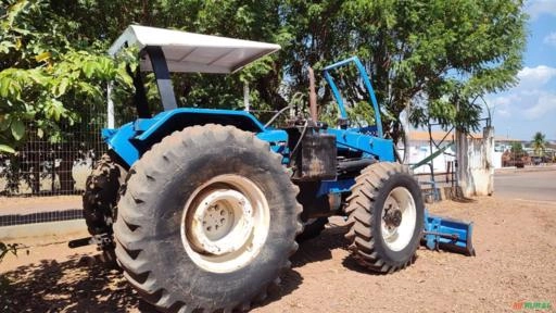 Trator New Holland 7630 2006 – Motor com Menos de 500 Horas + Lâmina Tatu Imagem Trator New Holland 7630 2006 – Motor com Menos de 500 Horas + Lâmina Tatu