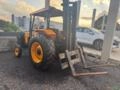 Empilhadeira Vantec + trator valtra 785 S - MWM Imagem Empilhadeira Vantec + trator valtra 785 S - MWM