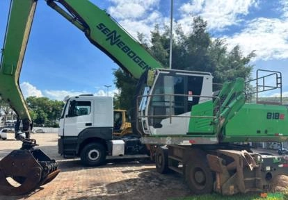 ESCAVADEIRA DE PNEU SENNEBOGEN 818M COM GARRA FLORESTAL, ANO 2022, COM 7.800 HORAS TRABALHADAS Imagem ESCAVADEIRA DE PNEU SENNEBOGEN 818M COM GARRA FLORESTAL, ANO 2022, COM 7.800 HORAS TRABALHADAS