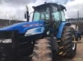 Trator New Holland TM 7040 4X4, ANO 2011, COM GRADE, 2º DONO, CABINE FECHADA Imagem Trator New Holland TM 7040 4X4, ANO 2011, COM GRADE, 2º DONO, CABINE FECHADA