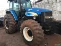 Trator New Holland TM 7040 4X4, ANO 2011, COM GRADE, 2º DONO, CABINE FECHADA Imagem Trator New Holland TM 7040 4X4, ANO 2011, COM GRADE, 2º DONO, CABINE FECHADA