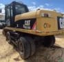 ESCAVADEIRA DE RODAS CATERPILLAR M318 ANO 2015, COM 12.900 HORAS TRABALHADAS Imagem ESCAVADEIRA DE RODAS CATERPILLAR M318 ANO 2015, COM 12.900 HORAS TRABALHADAS