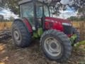 Trator MF 6714 com ensiladeira bokuda 2400 Imagem Trator MF 6714 com ensiladeira bokuda 2400