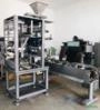 Linha Automática de Dosagem e Encartuchamento para Pós e Granulados Imagem Linha Automática de Dosagem e Encartuchamento para Pós e Granulados