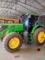 John Deere 6135M com piloto automático Imagem John Deere 6135M com piloto automático