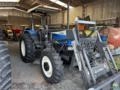 Trator New Holland TL75E 4x4 Ano 2005 com conjunto de concha dianteiro novo Imagem Trator New Holland TL75E 4x4 Ano 2005 com conjunto de concha dianteiro novo